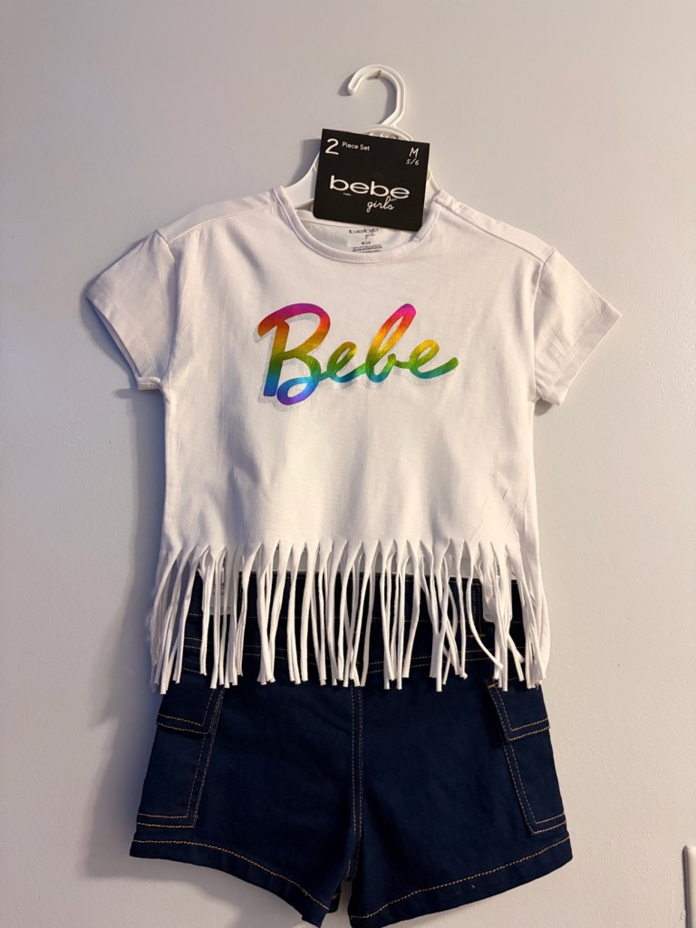 bebe White Fringe Crop Tee with Rainbow Script